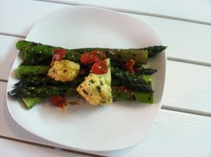 Grilled asparagus and cauliflower with roasted cherry tomatoes and fresh basil oil